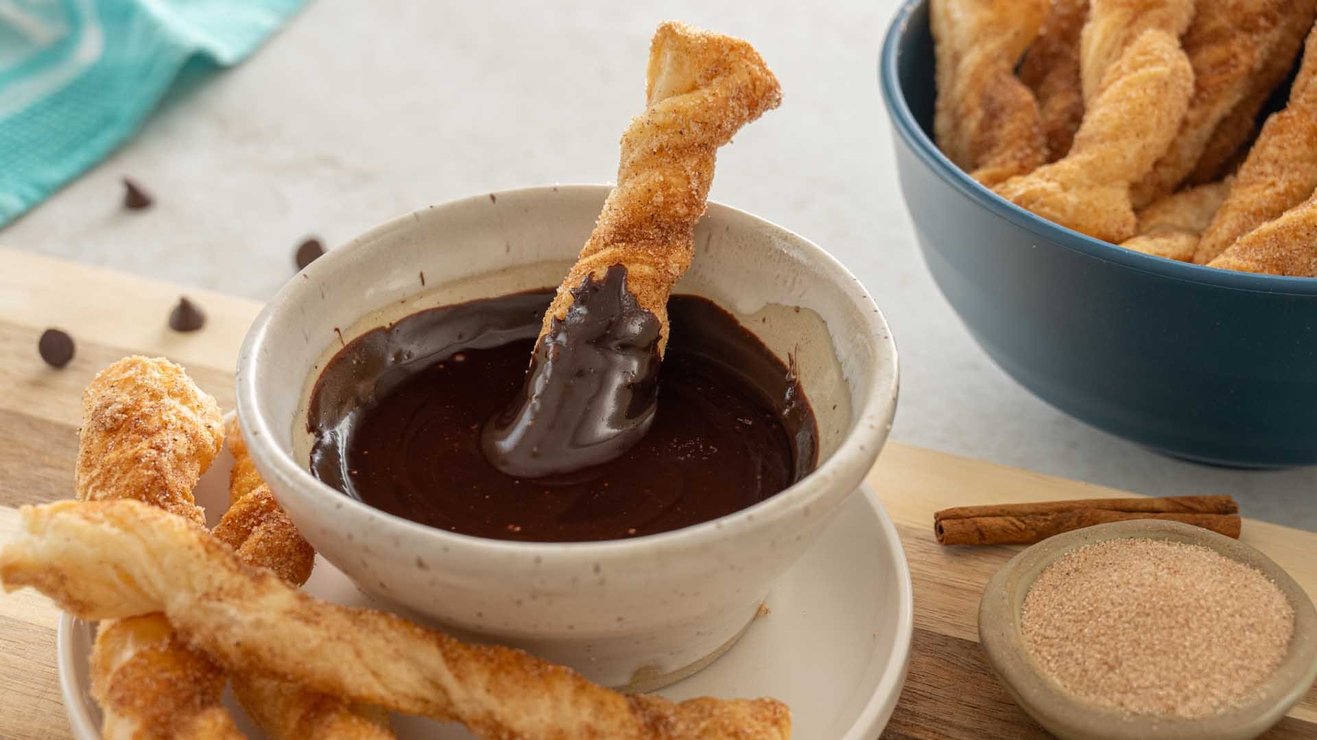 churro in chocolate dipping sauce