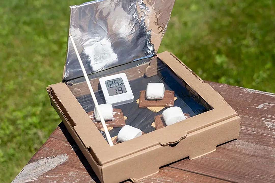 making hersheys smores inside a diy solar smores oven